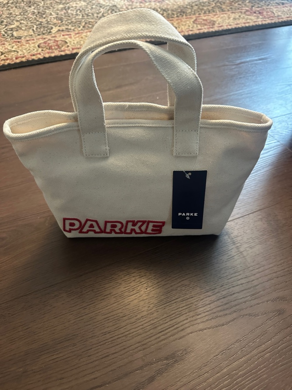 Parke Cream Canvas Tote Bag with Red Logo